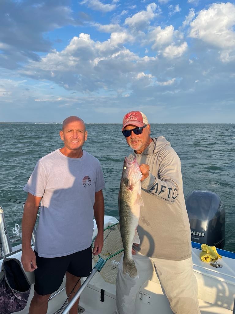 Anglers with walleye catch